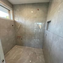 Bathroom tiling by jar group tiling